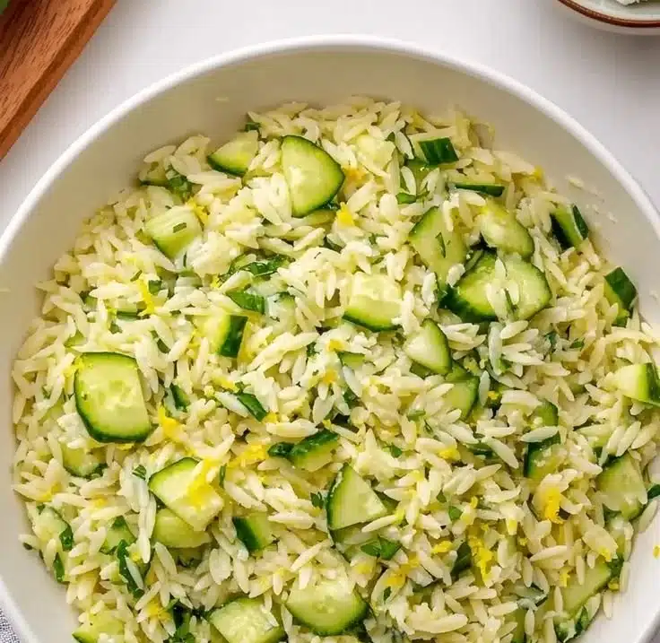 Zesty cucumber lemon orzo salad with fresh ingredients and vibrant flavors