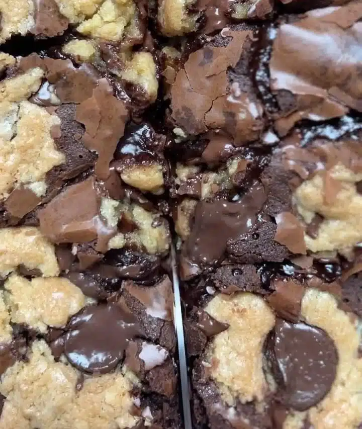 Delicious brown butter brookies stacked on a wooden table