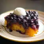 Caramelized blueberry upside down cake with a golden crust and juicy blueberries.