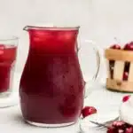 Delicious Cherry Pie Inspired Iced Tea served in a glass with cherries