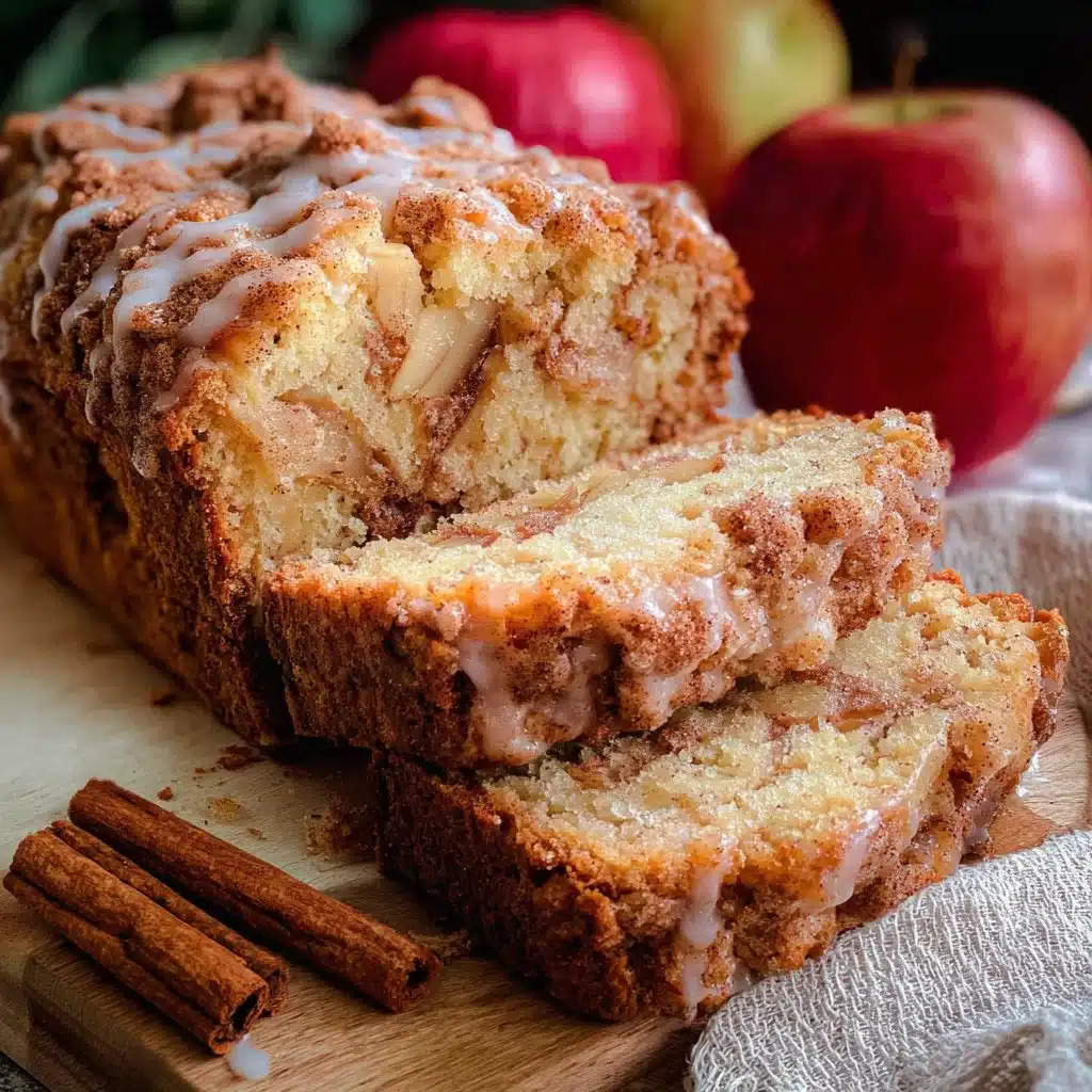 Loaf of freshly baked Cinnamon Apple Bread with cinnamon and apple slices