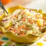 Hawaiian pineapple coleslaw served in a bowl with fresh ingredients