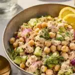 Simple Tuna Chickpea Salad with fresh vegetables and dressing