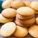 Homemade vanilla wafers stacked on a plate, perfect for snacks and desserts.