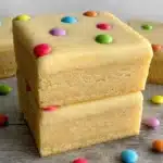 Delicious White Chocolate Cosmic Brownies drizzled with white chocolate.