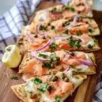 Delicious Mother's Day brunch spread featuring various dishes and floral decorations.