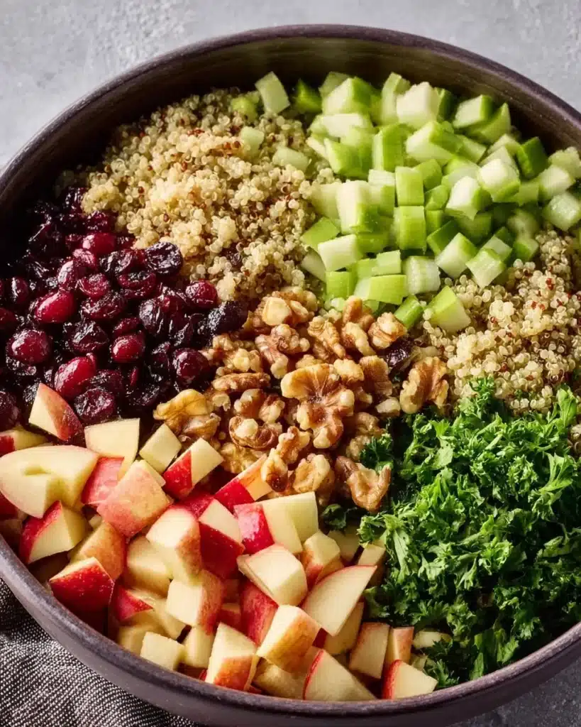 Colorful Apple Quinoa Salad with fresh ingredients in a bowl