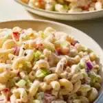 Delicious bowl of best macaroni salad with vegetables and dressing