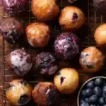 Delicious blueberry cake donuts with blueberry glaze on top