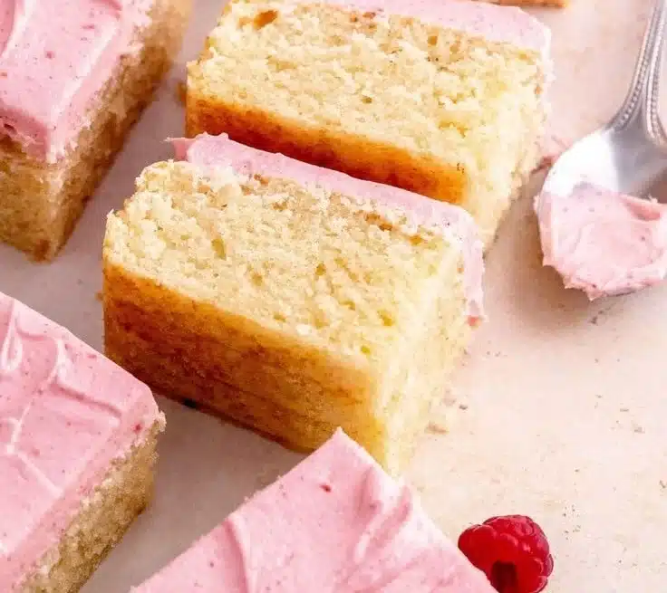 Delicious homemade Almond Cake with sliced almonds and frosting