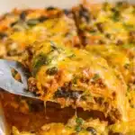 Delicious Beef Enchilada Casserole served with toppings