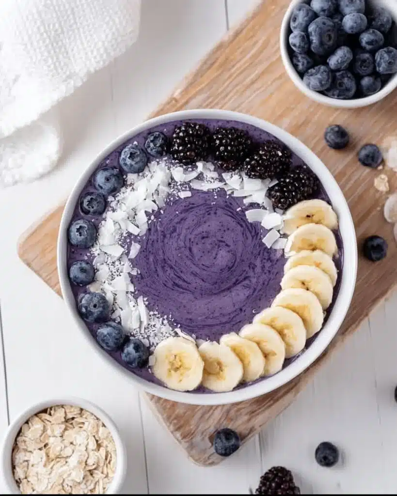 Blueberry banana bowl topped with fresh blueberries and banana slices