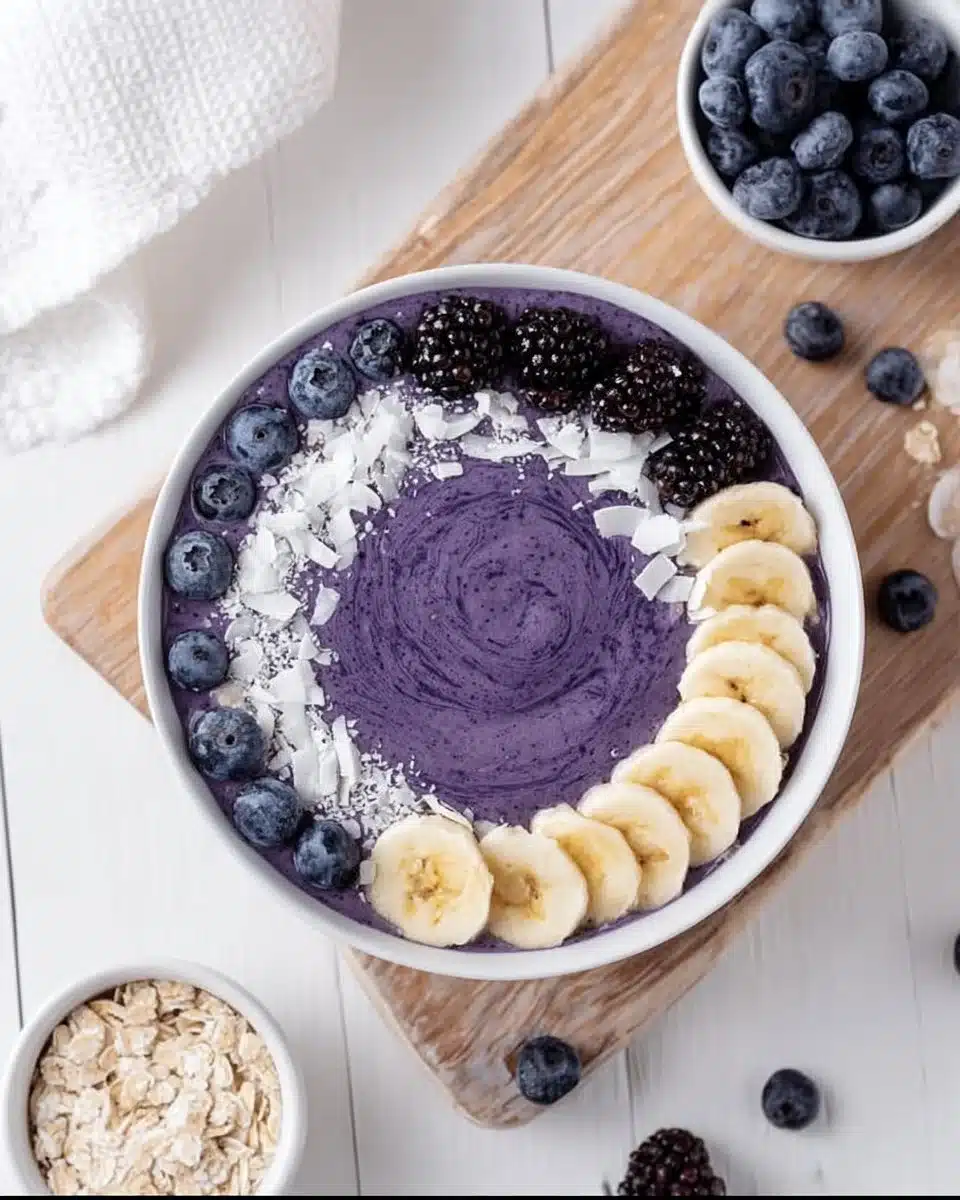 Blueberry banana bowl topped with fresh blueberries and banana slices