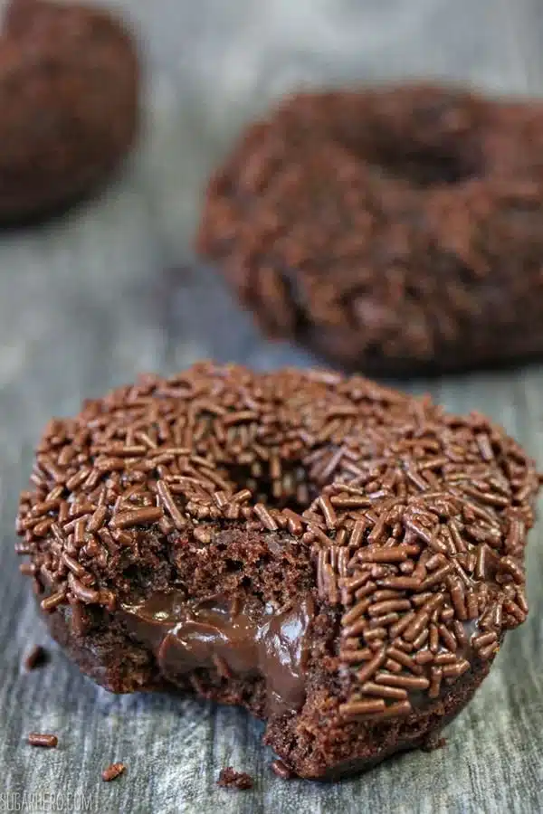 Delicious chocolate overload doughnuts topped with rich chocolate glaze and sprinkles