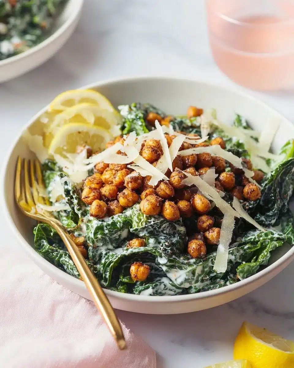 Kale Caesar Salad with Parmesan Roasted Chickpeas served in a bowl