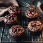 Delicious ultimate brownie muffins topped with chocolate chips